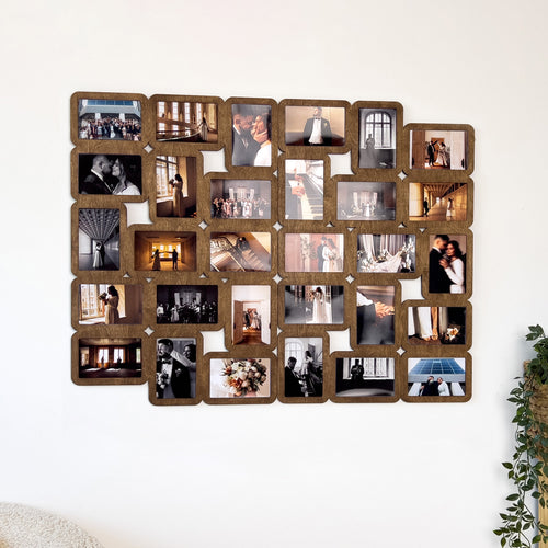 Big symmetrical picture frame collage mounted on a wall. This collage measures 29 inches in width and 38 inches in length and has 30 frames 4 by 6 inches. The frame can be painted in different colors.