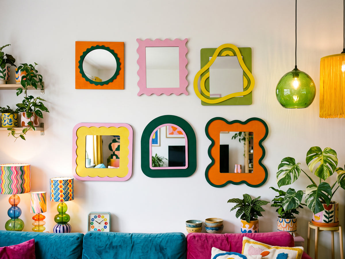 Colorful funky wall mirrors styled in a maximalist interior