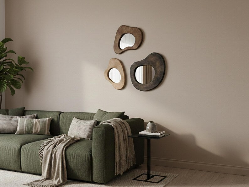 Organic mirror trio with soft asymmetric silhouettes and wood frames